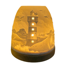 Laden Sie das Bild in den Galerie-Viewer, Porzellan Windlicht, Teelicht, Mini - Iglu "Leuchtturm mit Robbe" MI546
